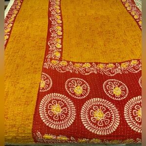 Yellow and Red Patterned Textile